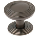 Richelieu 7070 transitional cabinet knob in honey bronze